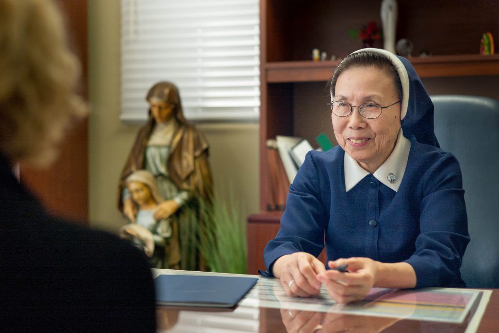 Staff member at desk